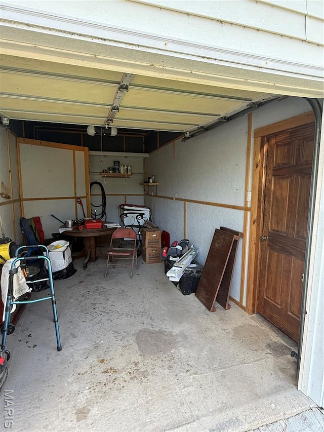 32 E 4th St, Gerald, MO 63037 - garage featuring a garage door opener