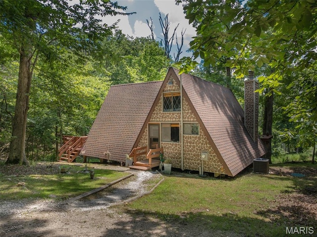 185 Hirshweg, Innsbrook, MO 63390 - a-frame style home with a front yard, a chimney, and roof with shingles