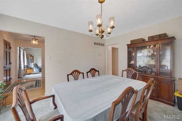 6235 Meadowlark Ln, Troy, MO 63379 - dining area with a chandelier