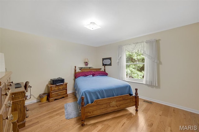 6235 Meadowlark Ln, Troy, MO 63379 - bedroom with light wood-style flooring and baseboards