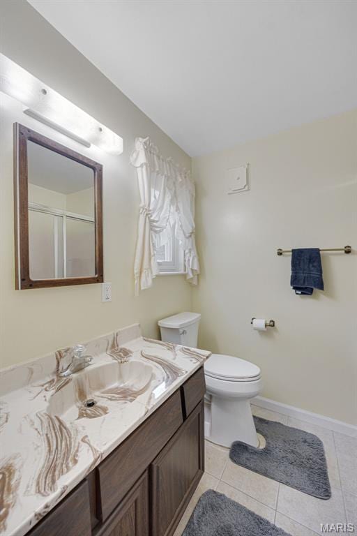 6235 Meadowlark Ln, Troy, MO 63379 - bathroom with vanity, tile patterned floors, and an enclosed shower
