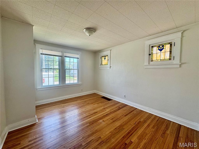 6328 Bradley Ave, Saint Louis, MO 63139 - spare room with wood finished floors