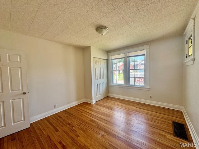 6328 Bradley Ave, Saint Louis, MO 63139 - unfurnished room with wood finished floors