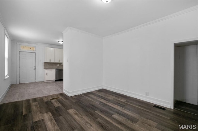 4340 Gannett St, Saint Louis, MO 63116 - spare room with dark wood-style flooring and ornamental molding