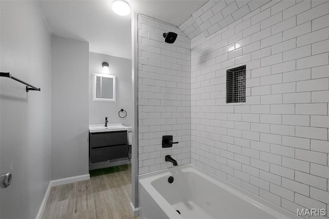 4340 Gannett St, Saint Louis, MO 63116 - bathroom with vanity, bathtub / shower combination, and wood finished floors