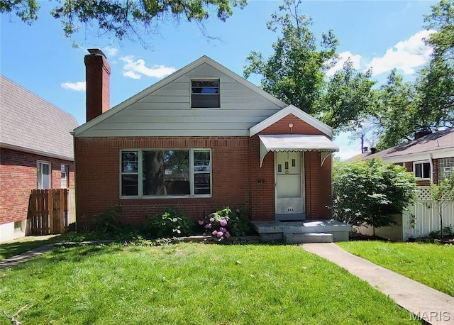 5464 Lindenwood Ave, Saint Louis, MO 63109 - bungalow-style home featuring brick siding and a chimney