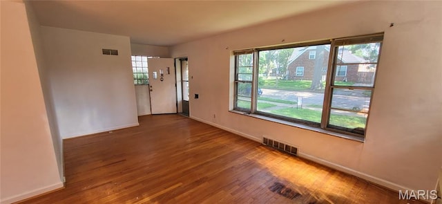 5464 Lindenwood Ave, Saint Louis, MO 63109 - spare room with wood finished floors