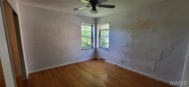5464 Lindenwood Ave, Saint Louis, MO 63109 - spare room with wood finished floors and ceiling fan