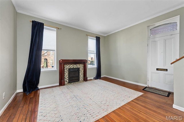 2610 Rutger St, Saint Louis, MO 63104 - living area with wood-type flooring, healthy amount of natural light, crown molding, and a fireplace