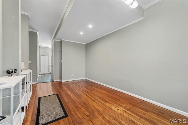 2610 Rutger St, Saint Louis, MO 63104 - unfurnished living room featuring crown molding, hardwood / wood-style flooring, and recessed lighting