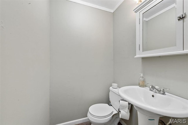 2610 Rutger St, Saint Louis, MO 63104 - half bathroom with a sink and crown molding