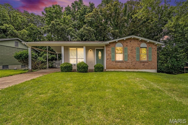 1483 Noche Ct, Fenton, MO 63026 - view of front of property featuring driveway, brick siding, a yard, and an attached carport