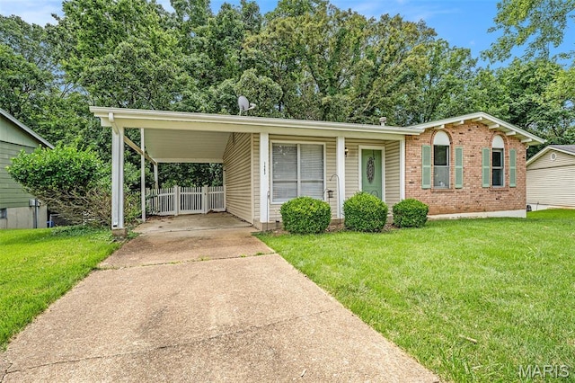 1483 Noche Ct, Fenton, MO 63026 - view of front of house featuring brick siding, concrete driveway, and an attached carport