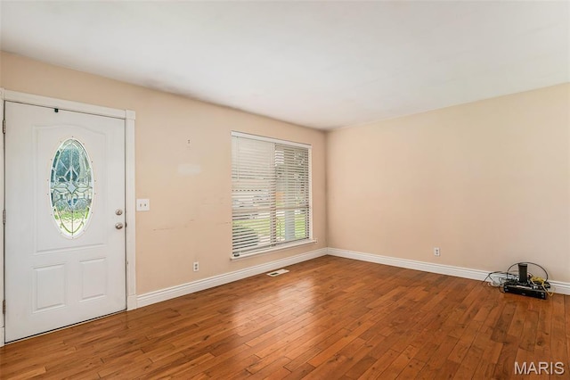 1483 Noche Ct, Fenton, MO 63026 - foyer entrance featuring wood-type flooring and baseboards