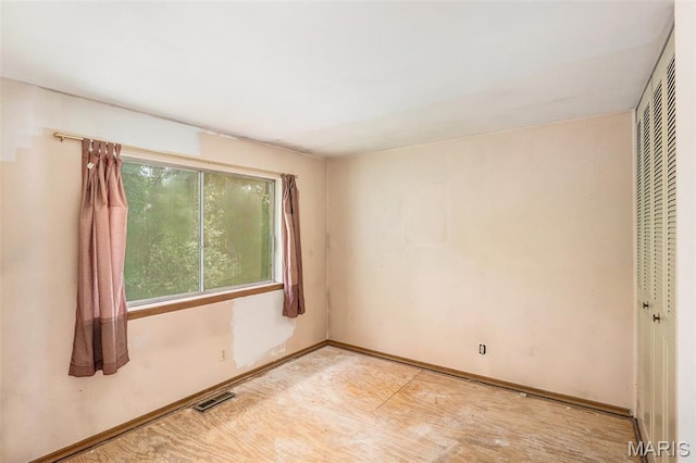 1483 Noche Ct, Fenton, MO 63026 - spare room featuring light wood finished floors and baseboards