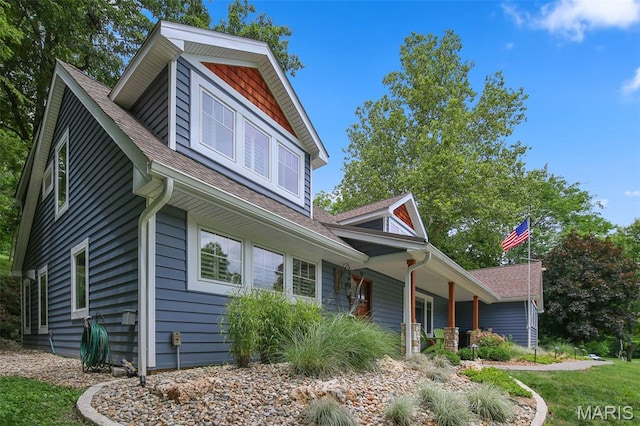 727 Madison Vly, Wildwood, MO 63005 - view of side of property featuring a porch and a shingled roof