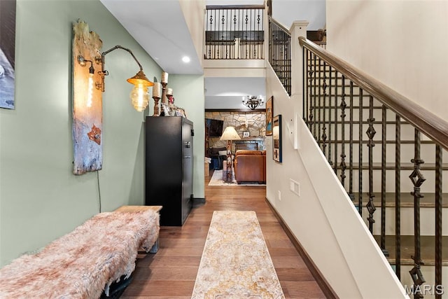 727 Madison Vly, Wildwood, MO 63005 - entrance foyer featuring wood finished floors, stairway, and recessed lighting