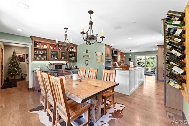 727 Madison Vly, Wildwood, MO 63005 - dining space featuring a chandelier, recessed lighting, and light wood-style flooring