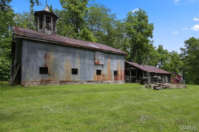 727 Madison Vly, Wildwood, MO 63005 - rear view of property with a yard and an outbuilding