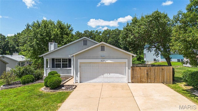 823 Whispering Windsong Dr, Ofallon, MO 63366 - view of front of property featuring a chimney, covered porch, and an attached garage