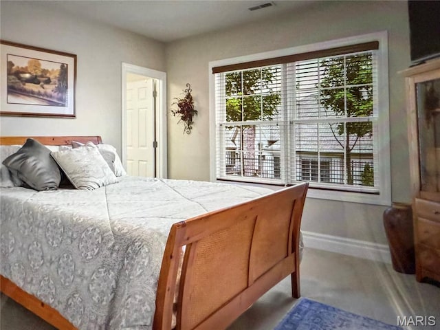 259 Meadowbrook Country Club Est, Ballwin, MO 63011 - bedroom with multiple windows and carpet