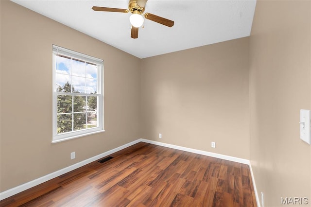 148 Castlewood Dr, Troy, MO 63379 - empty room featuring dark wood-style flooring and ceiling fan