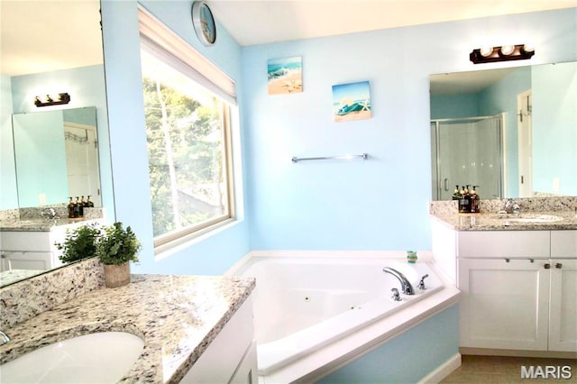 1001 Windsor Crest Ct, Cottleville, MO 63376 - bathroom with a shower stall, a tub with jets, and two vanities