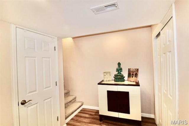 1001 Windsor Crest Ct, Cottleville, MO 63376 - hallway featuring dark wood-style flooring and stairway