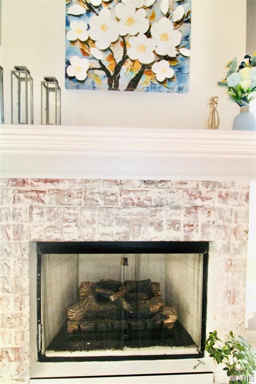 1001 Windsor Crest Ct, Cottleville, MO 63376 - detailed view of a tiled fireplace