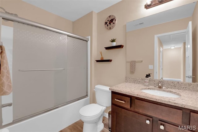 1001 Windsor Crest Ct, Cottleville, MO 63376 - bathroom featuring vanity, shower / bath combination with glass door, and wood finished floors