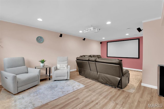 1001 Windsor Crest Ct, Cottleville, MO 63376 - home theater room with ornamental molding, wood finished floors, and recessed lighting