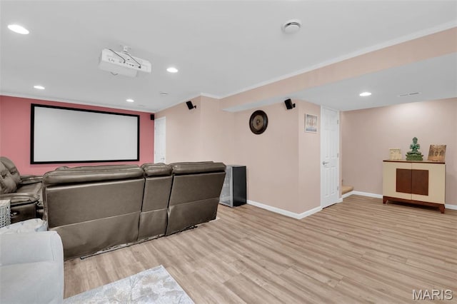 1001 Windsor Crest Ct, Cottleville, MO 63376 - home theater with light wood finished floors, crown molding, and recessed lighting