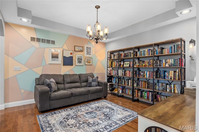 105 Cypress Meadows Dr, Wentzville, MO 63385 - living area featuring a chandelier, wood finished floors, recessed lighting, and a tray ceiling
