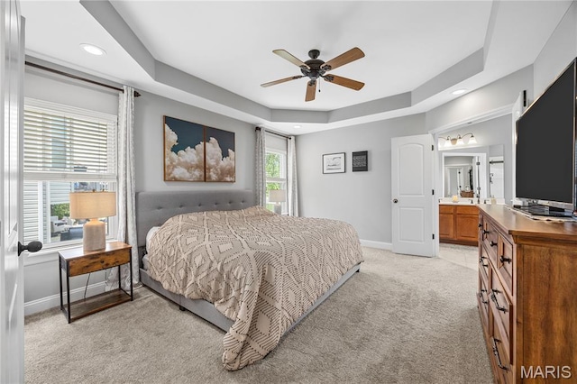 105 Cypress Meadows Dr, Wentzville, MO 63385 - bedroom with light colored carpet, a raised ceiling, recessed lighting, ensuite bath, and ceiling fan