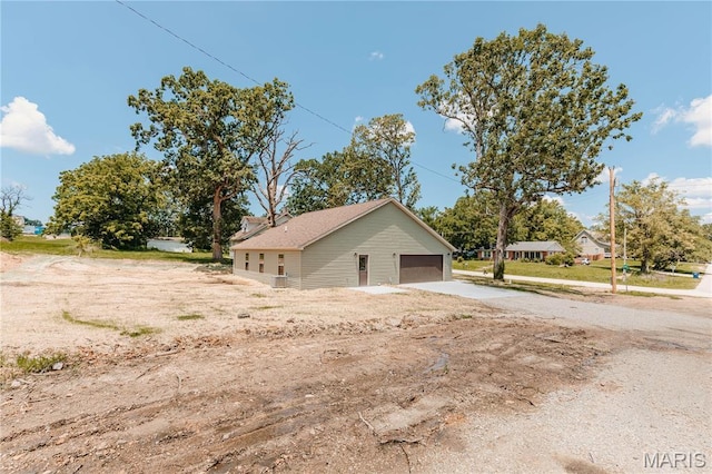 501 W 2nd, Dixon, MO 65459 - view of side of property featuring driveway