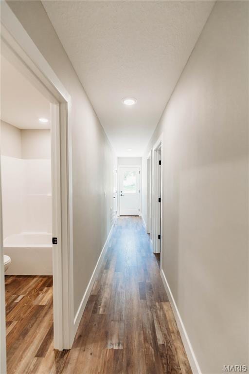 501 W 2nd, Dixon, MO 65459 - hall featuring wood finished floors