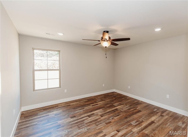 501 W 2nd, Dixon, MO 65459 - empty room with ceiling fan, dark wood-style flooring, and recessed lighting