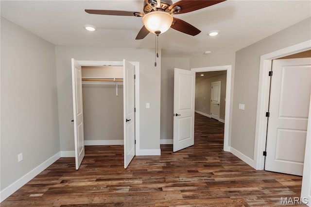 501 W 2nd, Dixon, MO 65459 - unfurnished bedroom with dark wood-style floors, recessed lighting, a closet, and ceiling fan