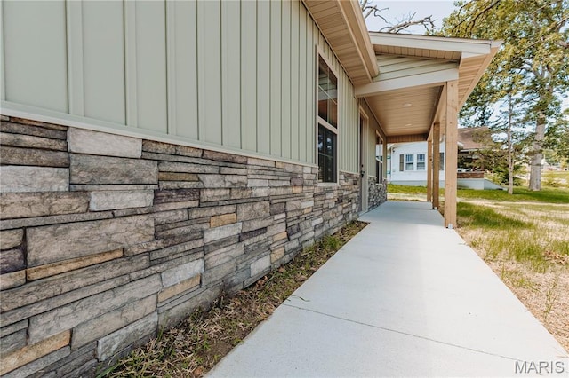 501 W 2nd, Dixon, MO 65459 - view of property exterior featuring stone siding and board and batten siding