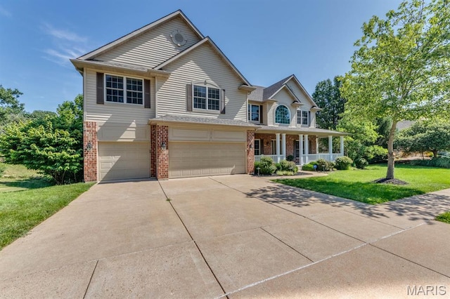 1515 Dietrich Glen Dr, Ballwin, MO 63021 - traditional-style house with brick siding, a garage, a porch, a front yard, and concrete driveway