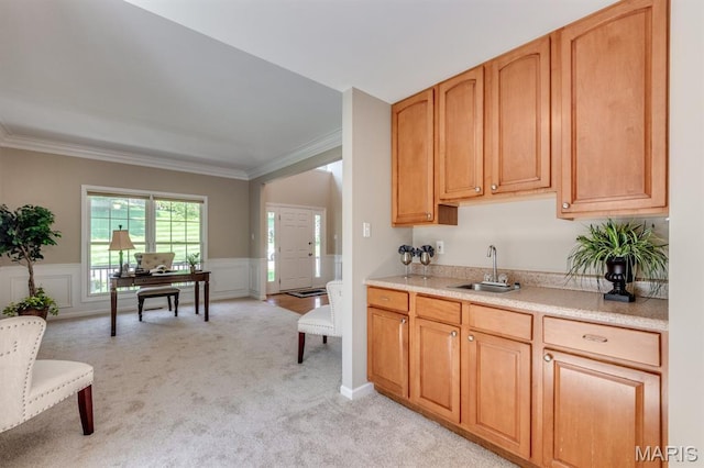 1515 Dietrich Glen Dr, Ballwin, MO 63021 - kitchen with light colored carpet, crown molding, light countertops, a wainscoted wall, and a desk