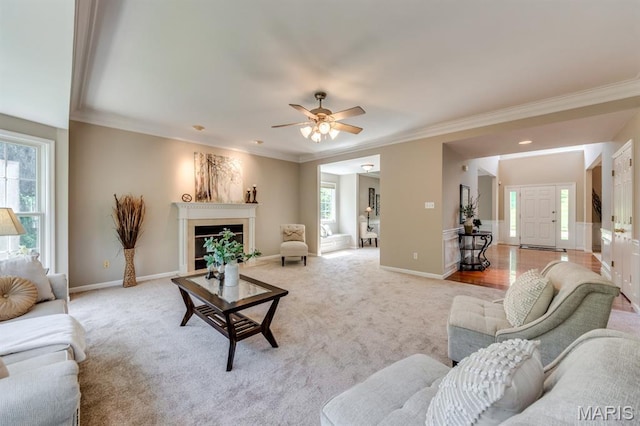 1515 Dietrich Glen Dr, Ballwin, MO 63021 - living room with healthy amount of natural light, ornamental molding, light colored carpet, and ceiling fan