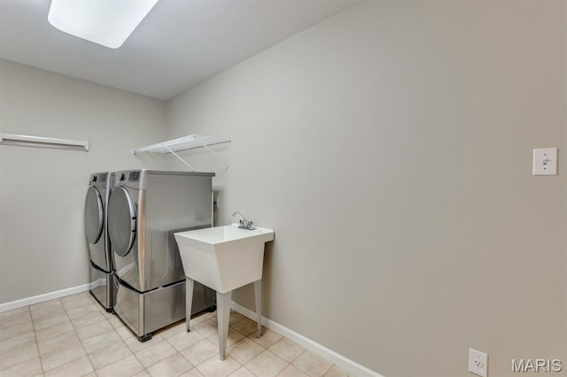 1515 Dietrich Glen Dr, Ballwin, MO 63021 - laundry room with washing machine and dryer and light tile patterned floors