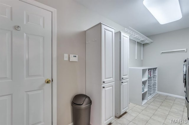 1515 Dietrich Glen Dr, Ballwin, MO 63021 - walk in closet featuring light tile patterned flooring