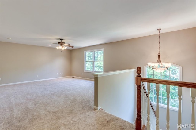 1515 Dietrich Glen Dr, Ballwin, MO 63021 - unfurnished room featuring light colored carpet, a chandelier, and ceiling fan