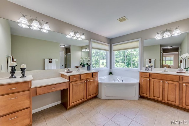 1515 Dietrich Glen Dr, Ballwin, MO 63021 - full bath featuring plenty of natural light, a garden tub, and two vanities