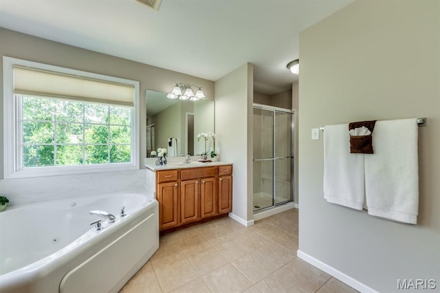 1515 Dietrich Glen Dr, Ballwin, MO 63021 - full bath featuring vanity, a shower stall, a jetted tub, and tile patterned floors