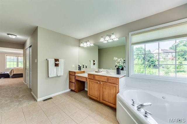 1515 Dietrich Glen Dr, Ballwin, MO 63021 - full bath featuring vanity, a garden tub, ensuite bathroom, and tile patterned flooring