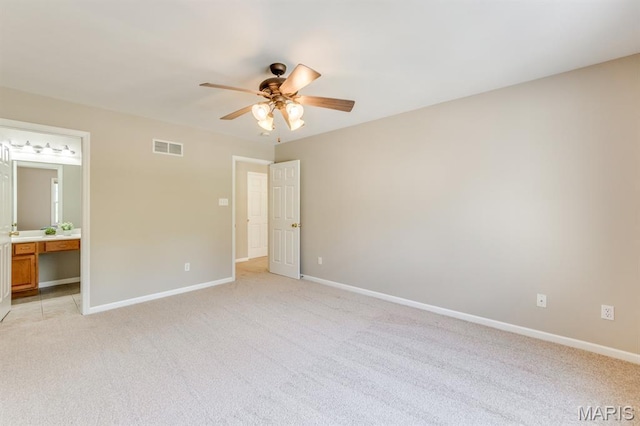 1515 Dietrich Glen Dr, Ballwin, MO 63021 - unfurnished bedroom featuring light carpet, a ceiling fan, and connected bathroom