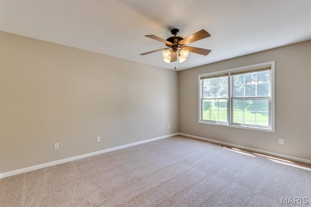 1515 Dietrich Glen Dr, Ballwin, MO 63021 - carpeted empty room featuring a ceiling fan and baseboards
